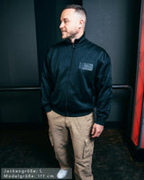 SAEBIS® Herren Trainingsjacke schwarz mit SAEBIS® Patch