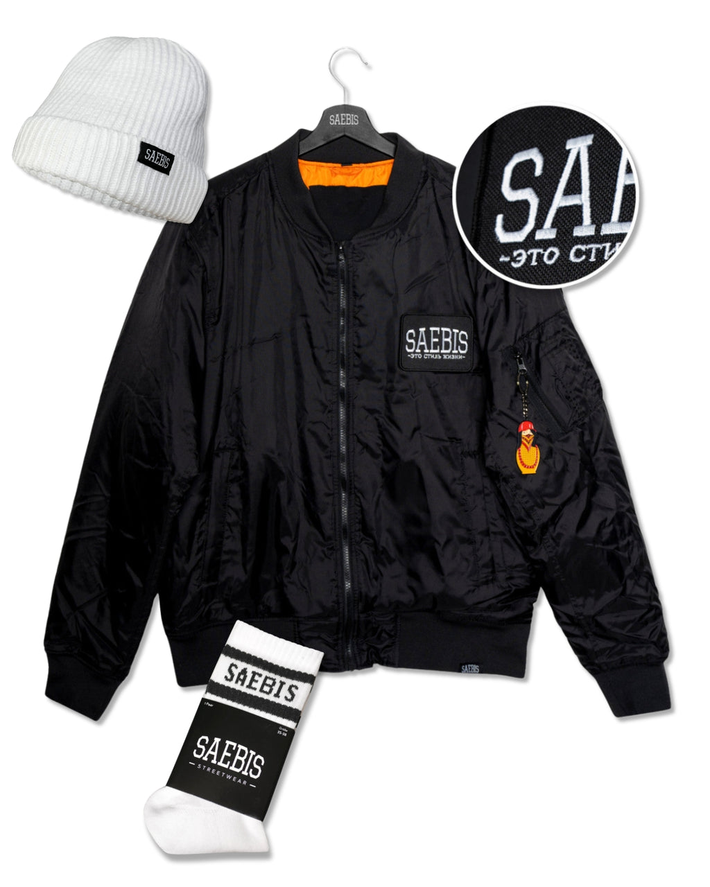 SAEBIS® Damen Winter-Paket bestehend aus Bomberjacke mit zwei Patches | Ribbed Beanie | Socken weiß