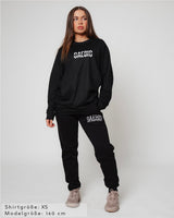 Это стиль жизни - Damen Oversized Langarm-Shirt schwarz by SAEBIS®