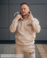 Lifestyle Herren Hoodie beige mit Stickerei by SAEBIS®